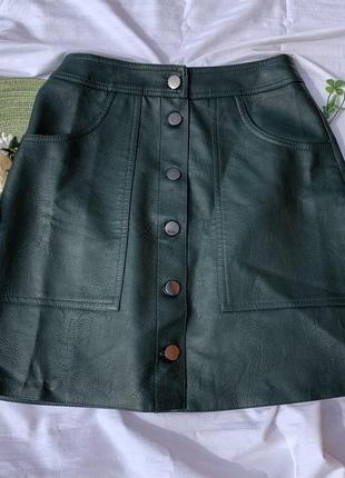 Шкіряна спідниця.