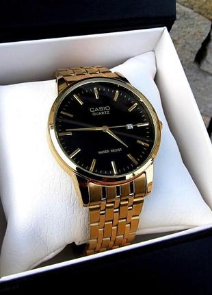 Золотые мужские наручные часы casio / касио