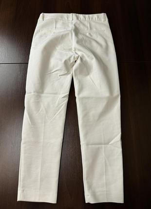 Білі брюки2 фото