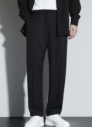 Чорні брюки вільного крою