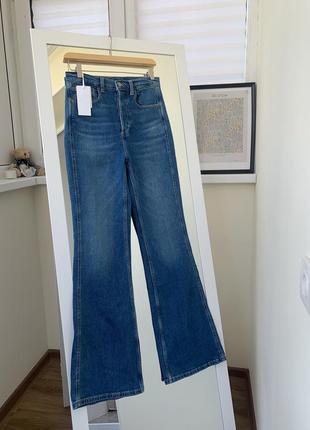 Джинсы клеш