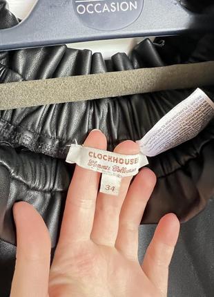 Шкіряна міні спідниця з карманами на резинці3 фото