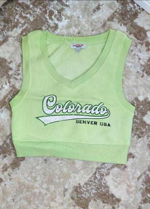 Класна вкорочена жилетка від відомого французького молодіжного одягу на розмір 2хс/хс.