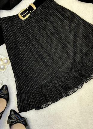 Чорна легенька блискуча юбка міні3 фото