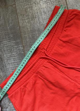 Трикотажні спортивні штани червоного кольору6 фото