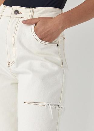 Прямые джинсы с разрезами на бедрах молочные трендовые с высокой посадкой2 фото