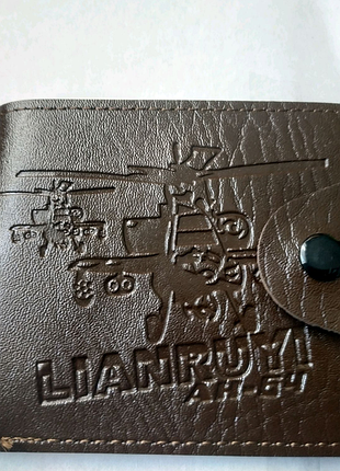 Гаманці чоловічі шкір замінник.нові.