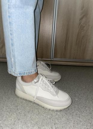 Кросівки білі жіночі8 фото