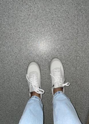 Кросівки білі жіночі9 фото