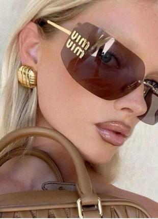 Окуляри в стилі miu miu жіночі безоправні з золотим логотипом