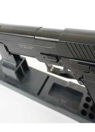 Дитячий пістолет sig sauer p226 металевий з глушником і лазерним прицілом 6 мм6 фото