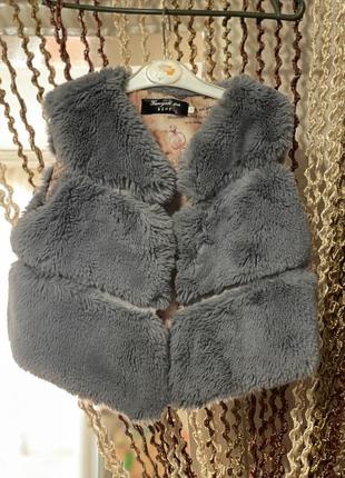 Жилетка на девушку