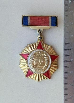 Нагрудный знак кндр. северная корея