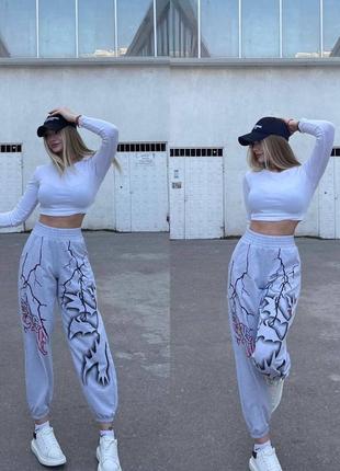 Стильные джоггеры с рисунком дракона