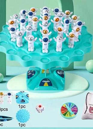 Настольна "збалансуй космонавтів" - і розвивай координацію!