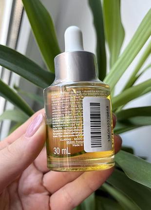 Масло для лица clarins santal treatment oil