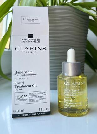 Масло для лица clarins santal treatment oil