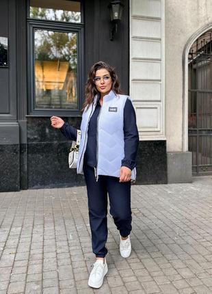 Стильная стеганая жилетка больших размеров