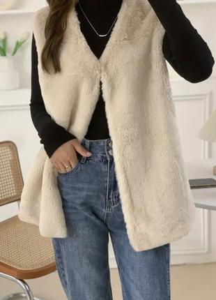 Женская жилетка