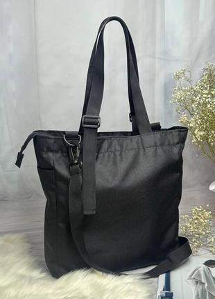 Женская черная сумка-шоппер с плечевым ремнем.5 фото