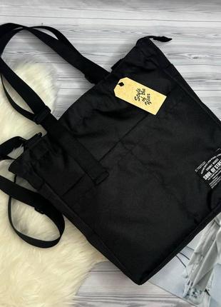 Женская черная сумка-шоппер с плечевым ремнем.10 фото