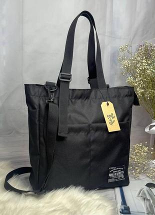Женская черная сумка-шоппер с плечевым ремнем.3 фото