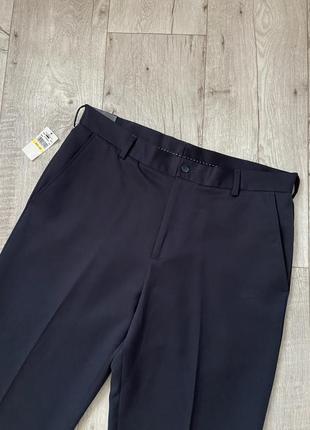 Нові люксові чоловічі брюки van heusen розмір w33 l324 фото