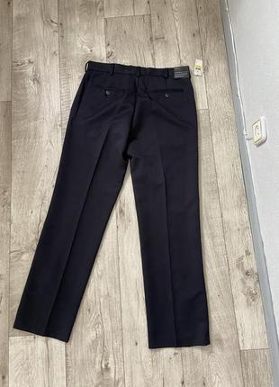 Нові люксові чоловічі брюки van heusen розмір w33 l327 фото