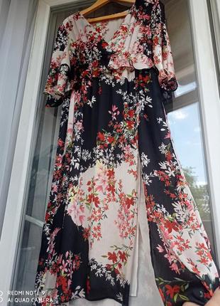 Шикарна сукня міді з розрізом і воланами3 фото