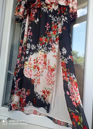 Шикарна сукня міді з розрізом і воланами4 фото