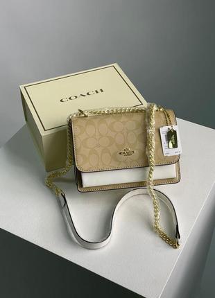 Сумка жіноча в стилі coach mini klare crossbody in signature canvas beige/white