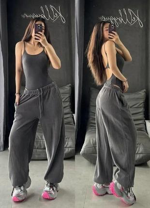 Об'ємні штани з затяжками внизу (oversize)