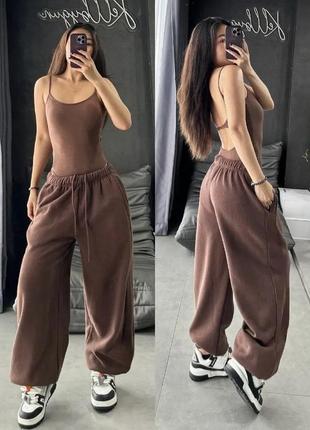 Об'ємні штани з затяжками внизу (oversize)