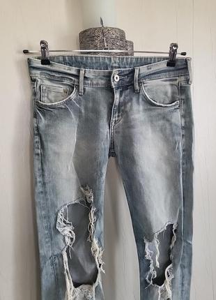 Рваные джинсы унисекс2 фото