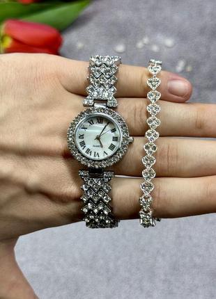 Набір срібного кольору: браслет та годинник (100710)6 фото