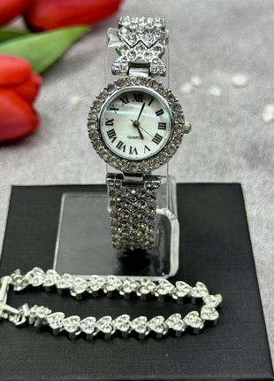Набір срібного кольору: браслет та годинник (100710)2 фото