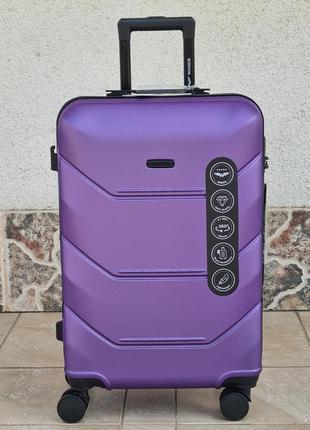 Чемодан wings 148 средний размер на спаренных колесах poland 🇵🇱 purple  💜8 фото