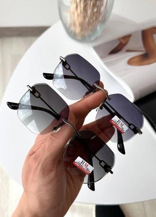 Сонцезахисні класичні окуляри без оправи2 фото
