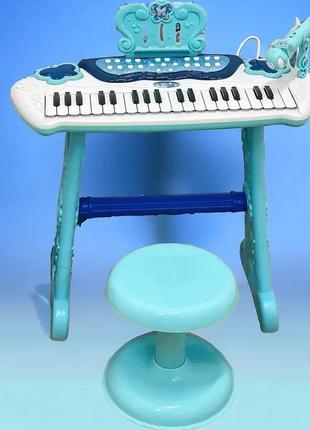 Дитячий синтезатор зі стільчиком і мікрофоном на батарейках функція запису electronic piano3 фото