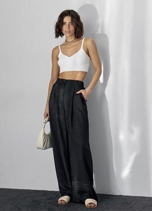 Черные свободные брюки палаццо