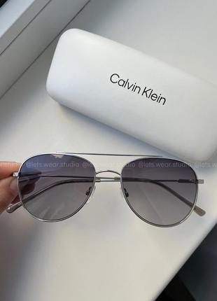 Нові оригінальні сонцезахисні окуляри унісекс calvin klein