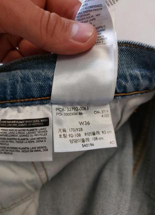 Джинсові шорти levi's 502 premium taper denim shorts8 фото
