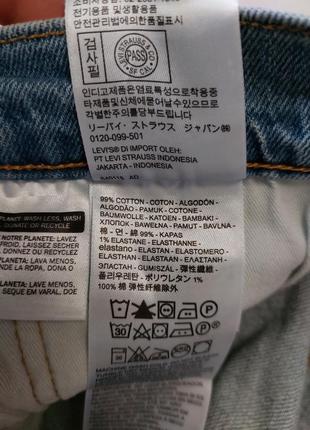 Джинсові шорти levi's 502 premium taper denim shorts7 фото