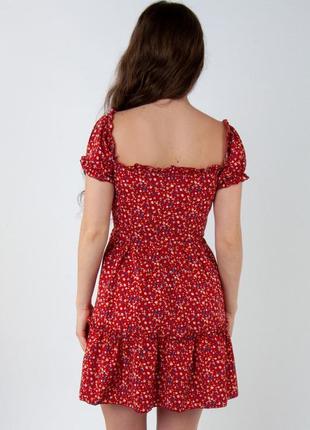Яскрава міні-сукня у квітковий принт5 фото