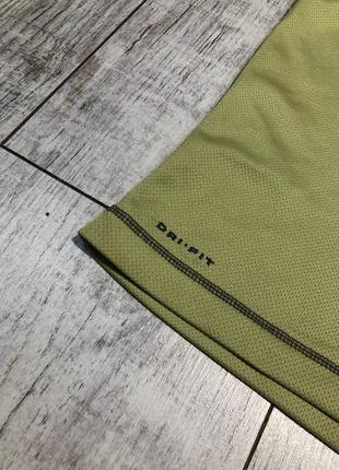 Жіноча спортивна футболка nike acg2 фото