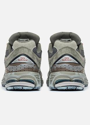 New balance 2002r grey brown pouch 9