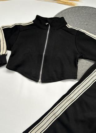 Костюм для дівчинки чорний спортивний8 фото