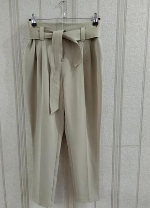 Брюки на защипах