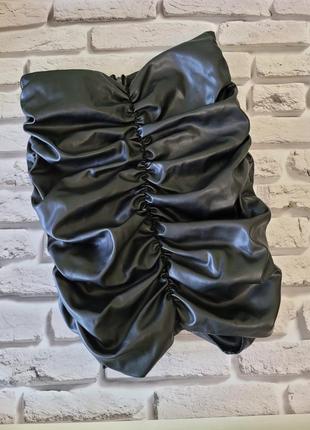 Срідниця зі штучної шкіри.