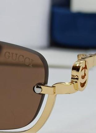 Окуляри в стилі gucci жіночі сонцезахисні вузькі модні коричневі в золотій металевій оправі3 фото
